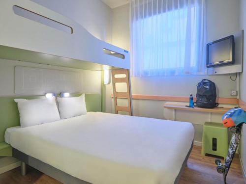 Habitación Doble con litera del hotel Ibis Budget Madrid Calle 30. Foto 2