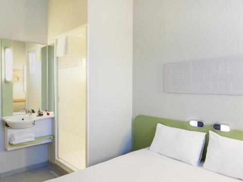 Habitación Doble - 2 camas del hotel Ibis Budget Madrid Calle 30. Foto 3