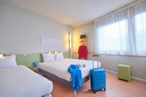 Habitación Doble - 2 camas del hotel Ibis Budget Madrid Calle 30. Foto 7