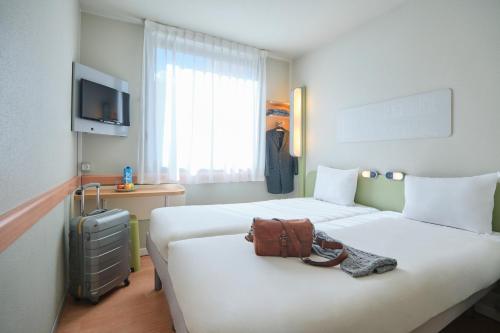 Habitación Doble - 2 camas del hotel Ibis Budget Madrid Calle 30. Foto 8