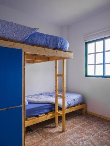 Double Room with Shared Bathroom del hotel Tenerife Climbing House. Foto 2