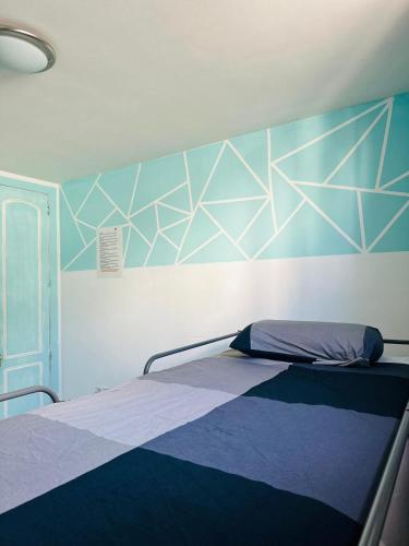 Habitación compartida femenina de 4 camas del hotel La Fresa. Foto 3