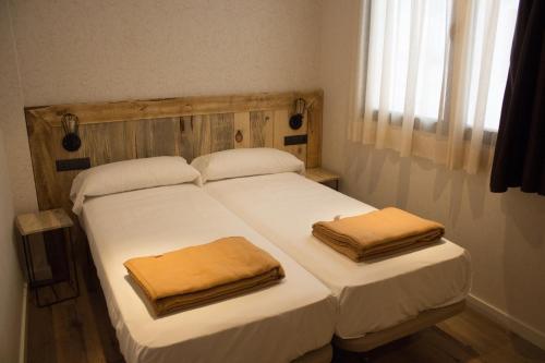 Habitación Doble con baño privado del hotel Black Swan Sevilla. Foto 4