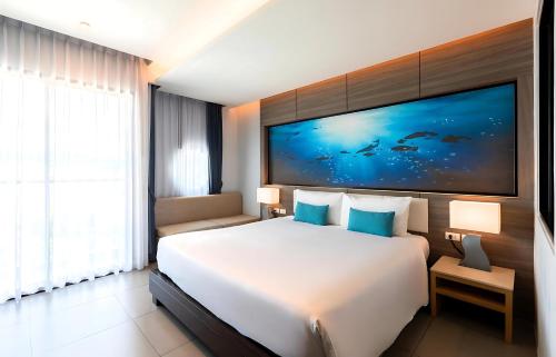 Habitación Doble Deluxe del hotel The Marina Phuket. Foto 3