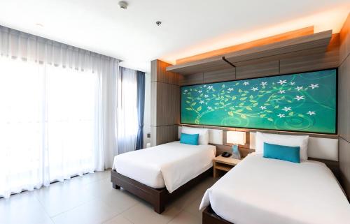 Habitación Doble Deluxe - 2 camas del hotel The Marina Phuket. Foto 3