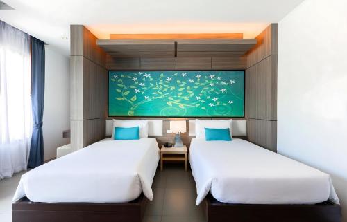 Habitación Doble Deluxe - 2 camas del hotel The Marina Phuket. Foto 4