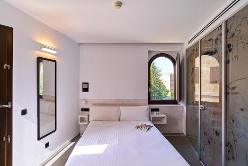 Habitación Doble Deluxe - 1 o 2 camas del hotel Melibea. Foto 15