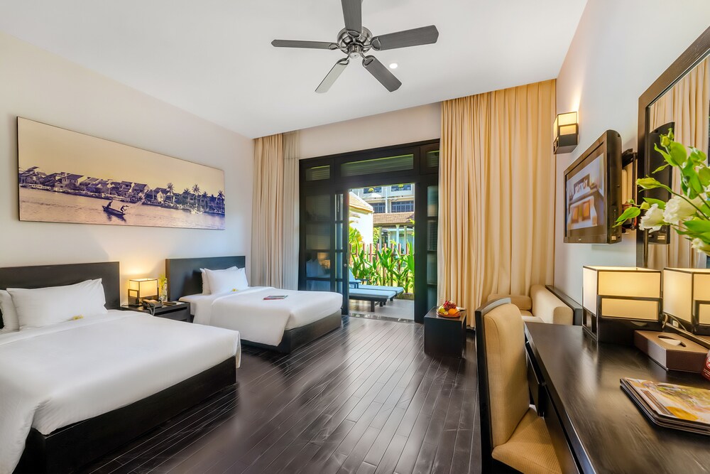 Suite junior, vistas al jardín, planta baja del hotel The Hoi An Historic. Foto 4