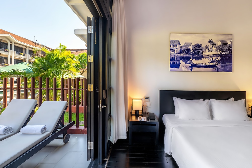 Suite junior, vistas al jardín, planta baja del hotel The Hoi An Historic. Foto 8