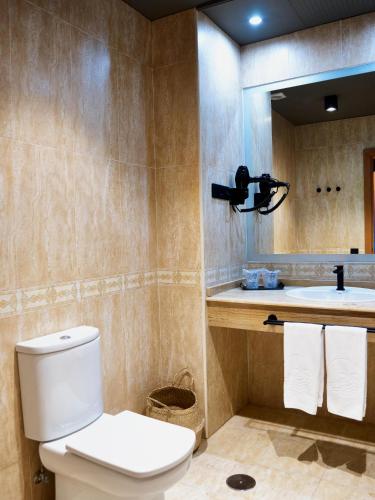 Habitación doble Vista Piscina 3 camas individuales del hotel Coral Cotillo Beach. Foto 4