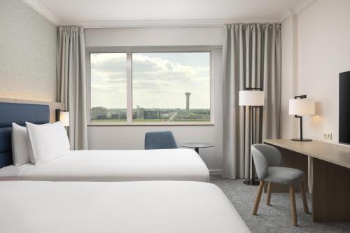 Habitación Executive - 2 camas del hotel Hilton Paris Charles de Gaulle Airport. Foto 1