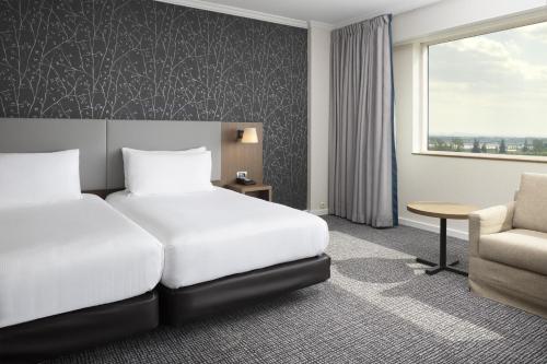 Habitación Familiar Deluxe - 2 camas del hotel Hilton Paris Charles de Gaulle Airport