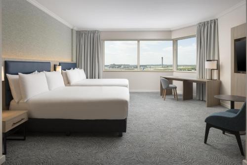 Habitación Executive - 2 camas grandes del hotel Hilton Paris Charles de Gaulle Airport. Foto 2