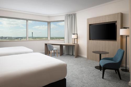 Habitación Executive - 2 camas grandes del hotel Hilton Paris Charles de Gaulle Airport. Foto 4