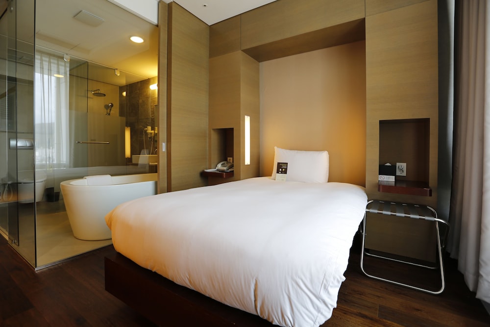 Habitación superior, 1 cama individual del hotel Grand Mercure Ambassador Changwon. Foto 1