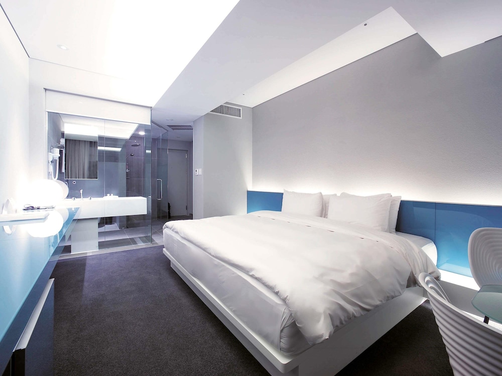 Habitación de Lujo, 1 cama king size del hotel Grand Mercure Ambassador Changwon. Foto 7