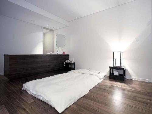 Habitación tradicional coreana - Ondol del hotel Grand Mercure Ambassador Changwon. Foto 1