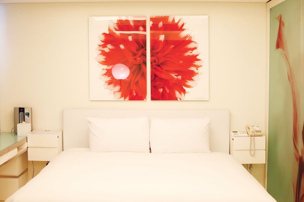 SUITE RESIDENCIAL, 1 Cama King Size del hotel Grand Mercure Ambassador Changwon. Foto 2