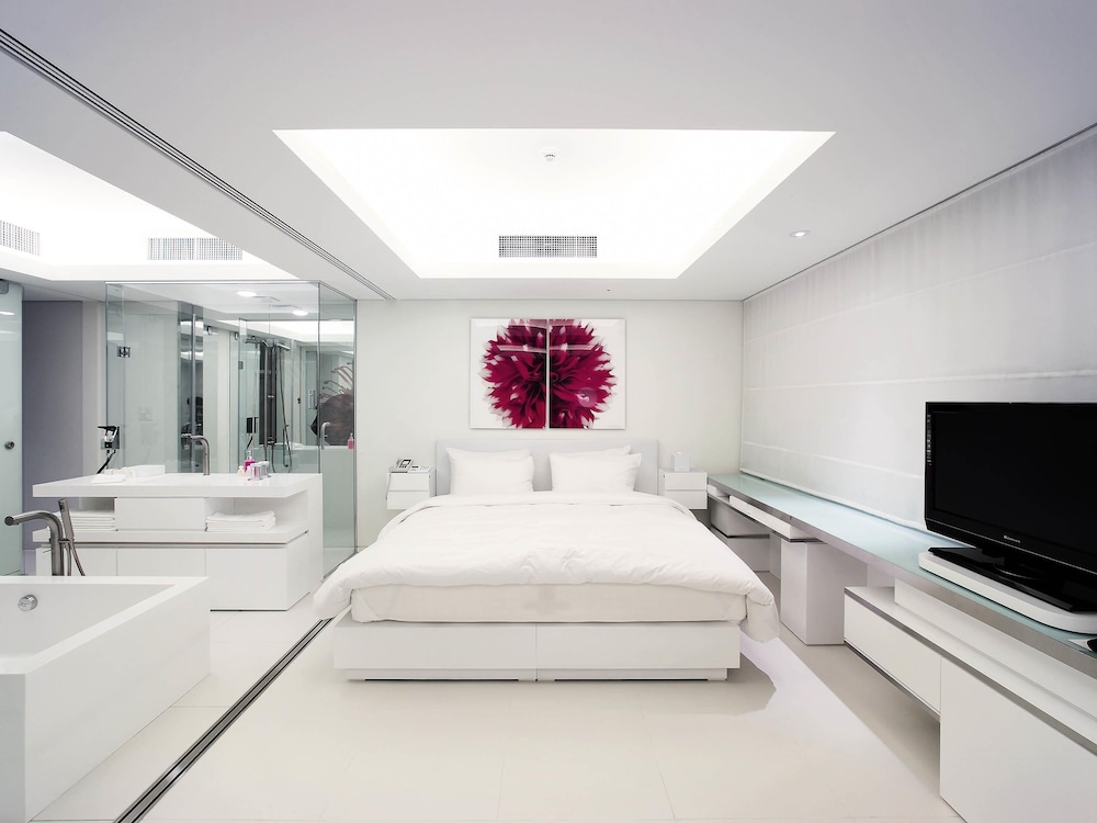 SUITE RESIDENCIAL, 1 Cama King Size del hotel Grand Mercure Ambassador Changwon. Foto 4