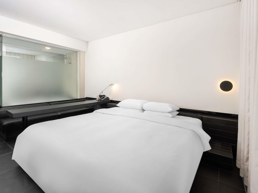 Habitación de Lujo, 1 cama king size del hotel Grand Mercure Ambassador Changwon. Foto 9