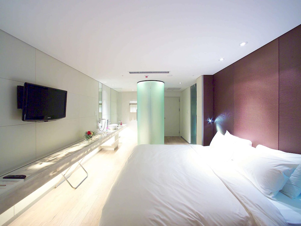 Habitación de Lujo, 1 cama king size del hotel Grand Mercure Ambassador Changwon. Foto 11