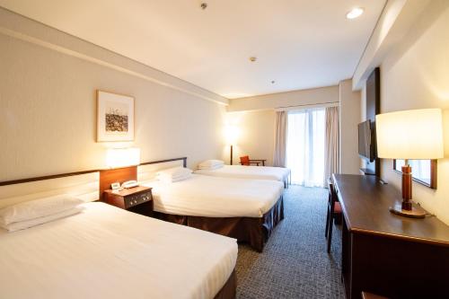 Habitación Triple Estándar con acceso al centro de fitness - Para no fumadores del hotel Kyoto Tokyu. Foto 4