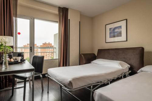 Habitación Familiar del hotel Medium Valencia. Foto 1