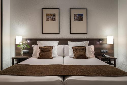 Habitación Familiar del hotel Medium Valencia. Foto 3