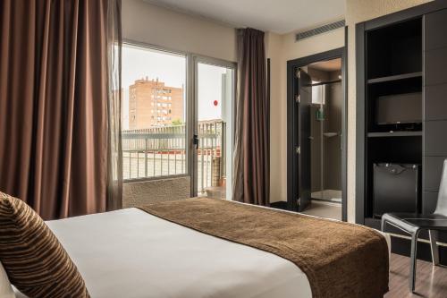 Habitación Individual del hotel Medium Valencia. Foto 1