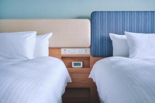 Habitación doble con 2 camas - Planta premium del edificio principal - No fumadores del hotel Miyako Kyoto Hachijo. Foto 1