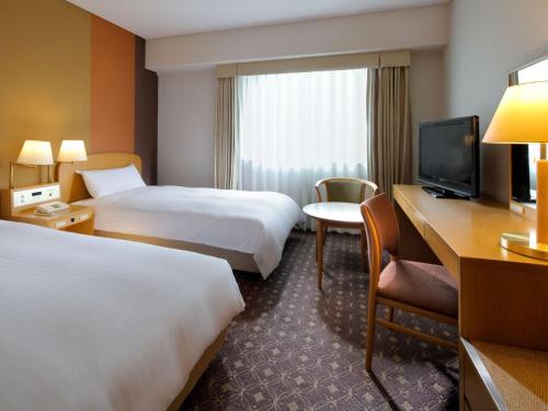 Habitación Compacta Doble con 2 camas - Planta estándar del edificio principal - No fumadores del hotel Miyako Kyoto Hachijo. Foto 2