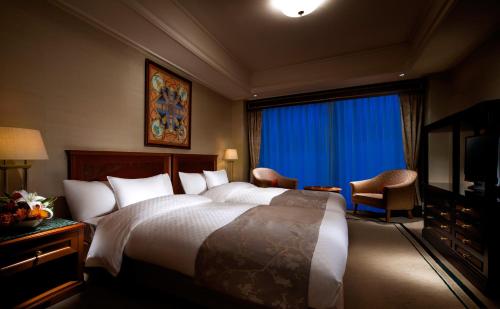 Suite Doble con acceso a la piscina y al centro de fitness - 2 camas - Planta Executive - No fumadores del hotel Rihga Royal Kyoto. Foto 4