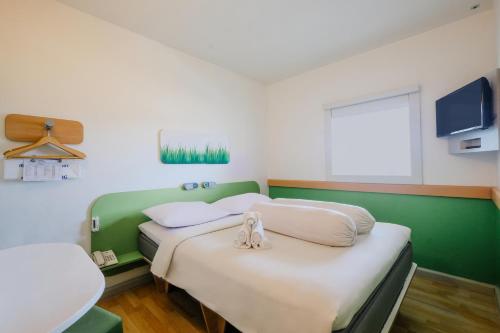 Habitación Estándar - 1 cama grande del hotel Ibis Budget Makassar Airport