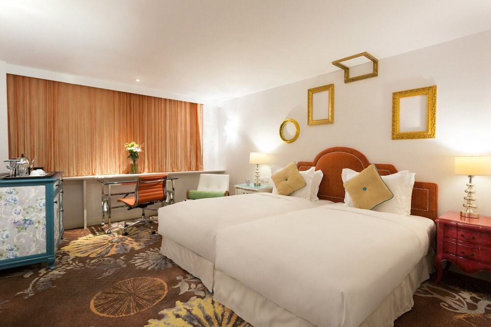 Habitación Deluxe del hotel The Luxe Manor