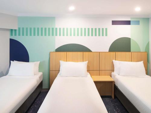 Habitación Triple Superior del hotel Ibis Styles Sydney Central. Foto 6