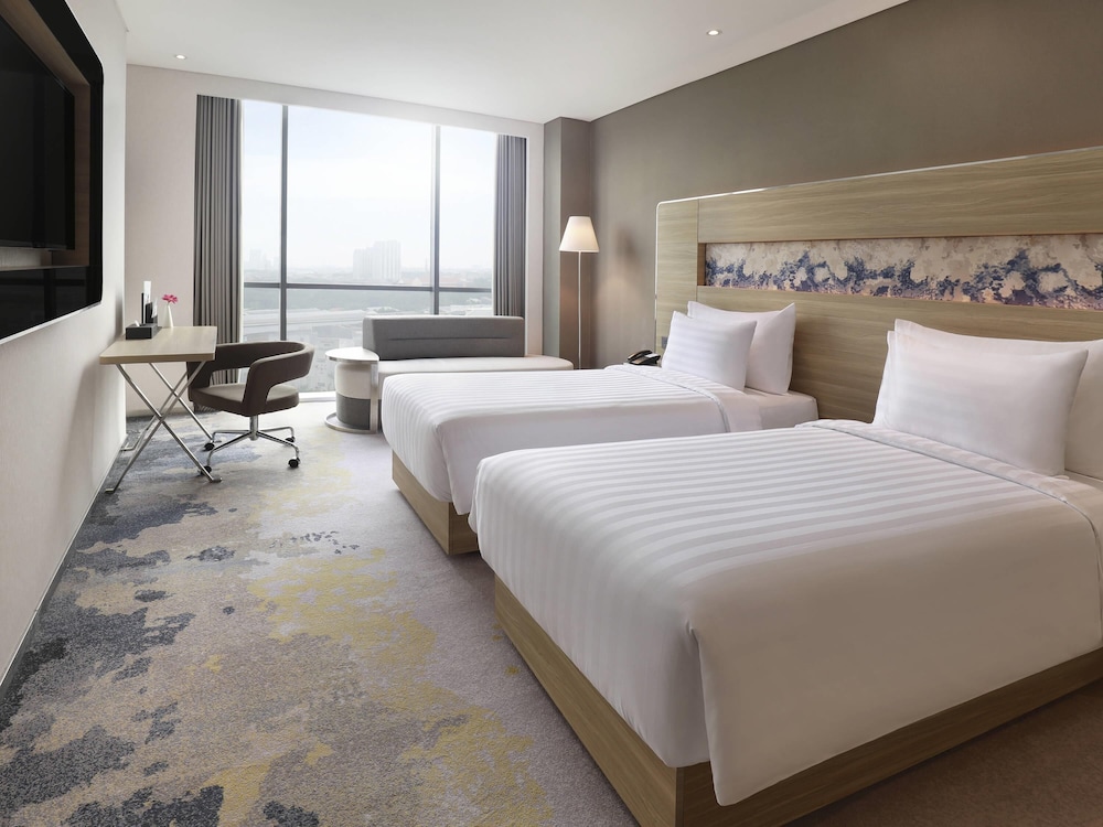 Deluxe con Dos Camas Individuales del hotel Novotel Samator Surabaya Timur