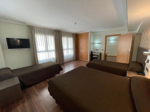 Habitación Familiar Confort del hotel 4C Bravo Murillo. Foto 2