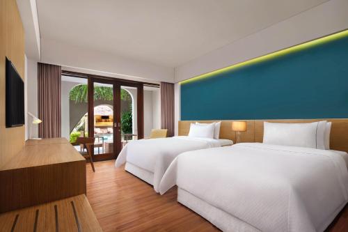 Deluxe Twin Room with Pool Access - Garden Level with Free Mini Bar, Daily Shuttle to Monkey Forest, Daily Yoga, Free Bike to borrow, Free Family Acti del hotel Element By Westin Bali Ubud - Chse Certified