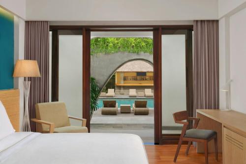 Deluxe Twin Room with Pool Access - Garden Level with Free Mini Bar, Daily Shuttle to Monkey Forest, Daily Yoga, Free Bike to borrow, Free Family Acti del hotel Element By Westin Bali Ubud - Chse Certified. Foto 2