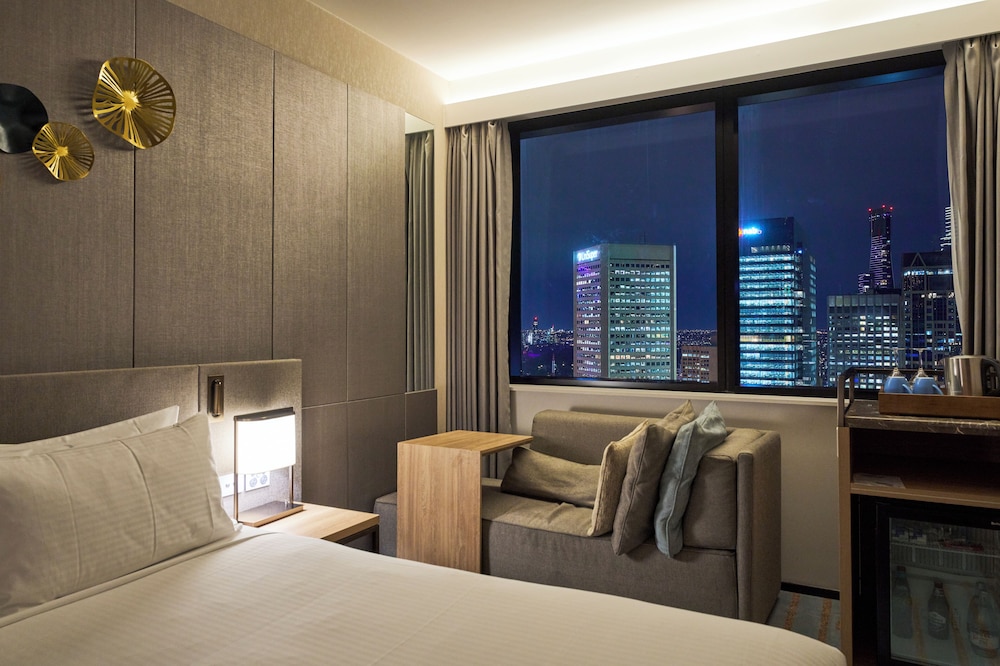 Habitación Estándar 1 Cama King del hotel Novotel Melbourne Central. Foto 3