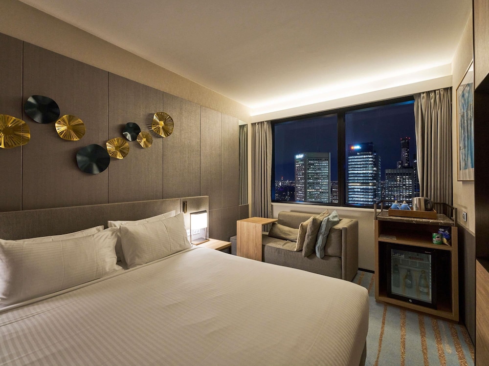 Habitación Estándar 1 Cama King del hotel Novotel Melbourne Central. Foto 4