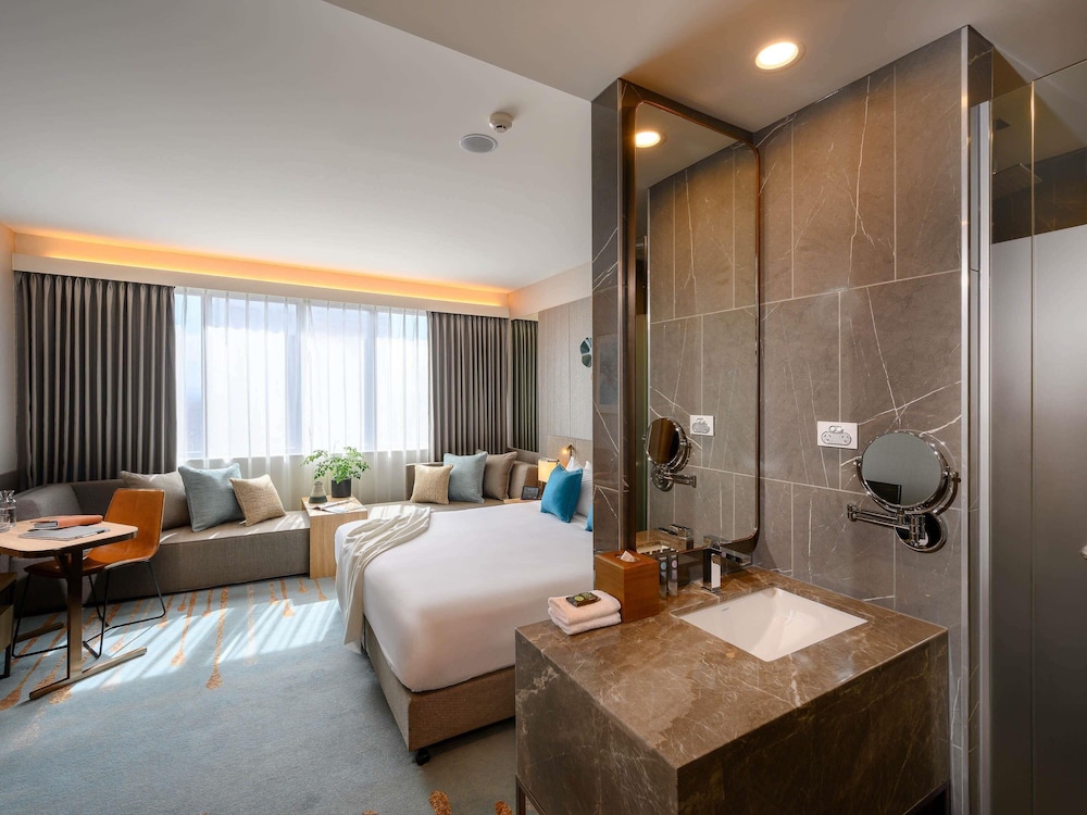 Habitación Deluxe 1 Cama King del hotel Novotel Melbourne Central. Foto 4