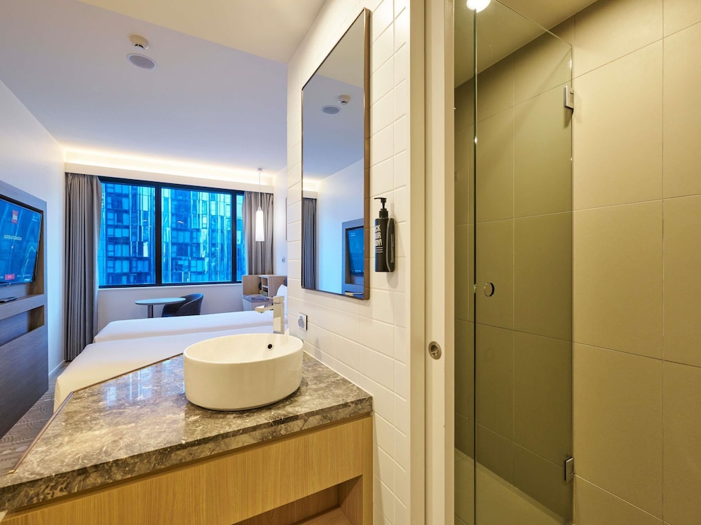 Habitación Superior con 2 Camas Zip del hotel Ibis Melbourne Central. Foto 4