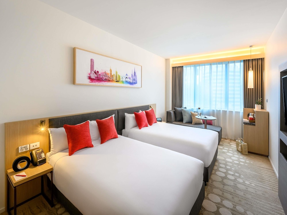 Habitación Superior con 2 camas dobles del hotel Ibis Melbourne Central. Foto 4