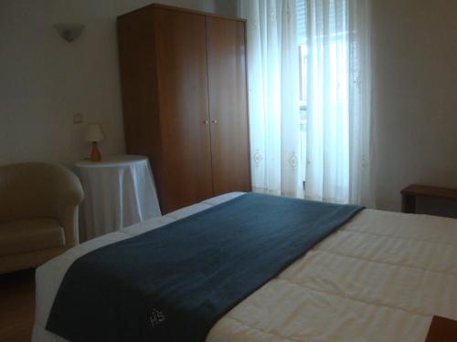 Habitación Individual del hotel Santos. Foto 1