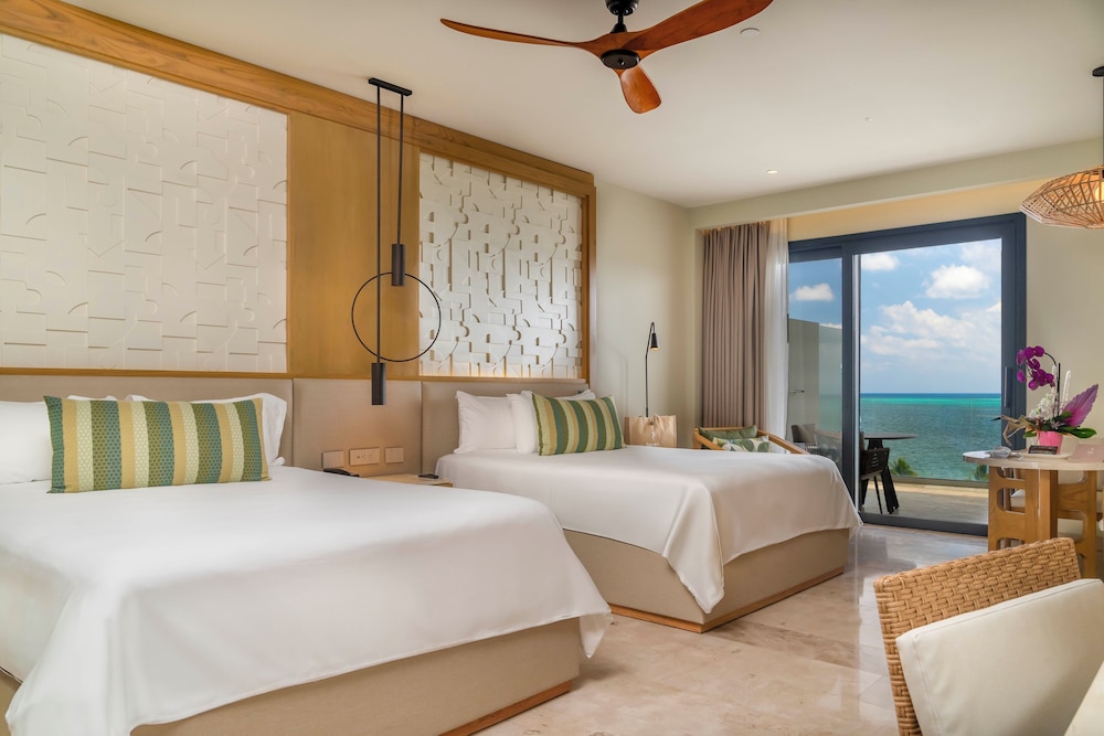 Suite Junior Serenity Club con 2 camas Queen y vista al mar del hotel Haven Riviera Cancun - All Inclusive - Adults Only. Foto 3