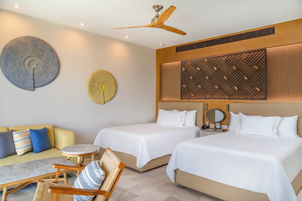 Suite junior, 2 camas dobles, vistas parciales al mar del hotel Haven Riviera Cancun - All Inclusive - Adults Only