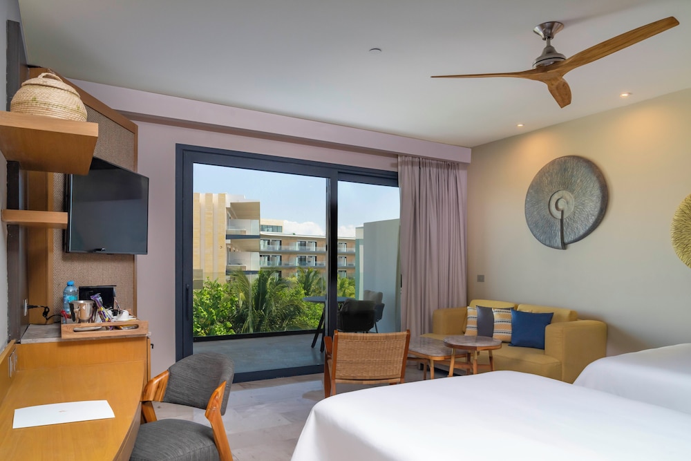 Suite junior, 2 camas dobles, vistas parciales al mar del hotel Haven Riviera Cancun - All Inclusive - Adults Only. Foto 1