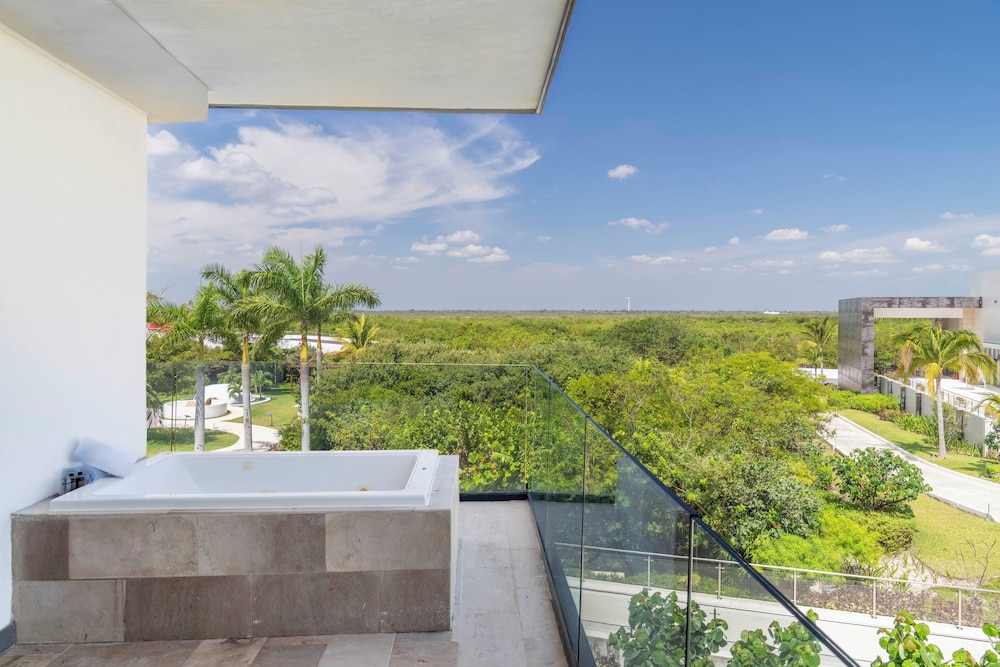 Suite junior, 2 camas dobles, vistas parciales al mar del hotel Haven Riviera Cancun - All Inclusive - Adults Only. Foto 3