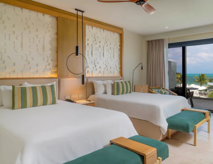 Suite Junior Serenity Club con 2 Camas Queen y Vista Parcial al Mar del hotel Haven Riviera Cancun - All Inclusive - Adults Only. Foto 4